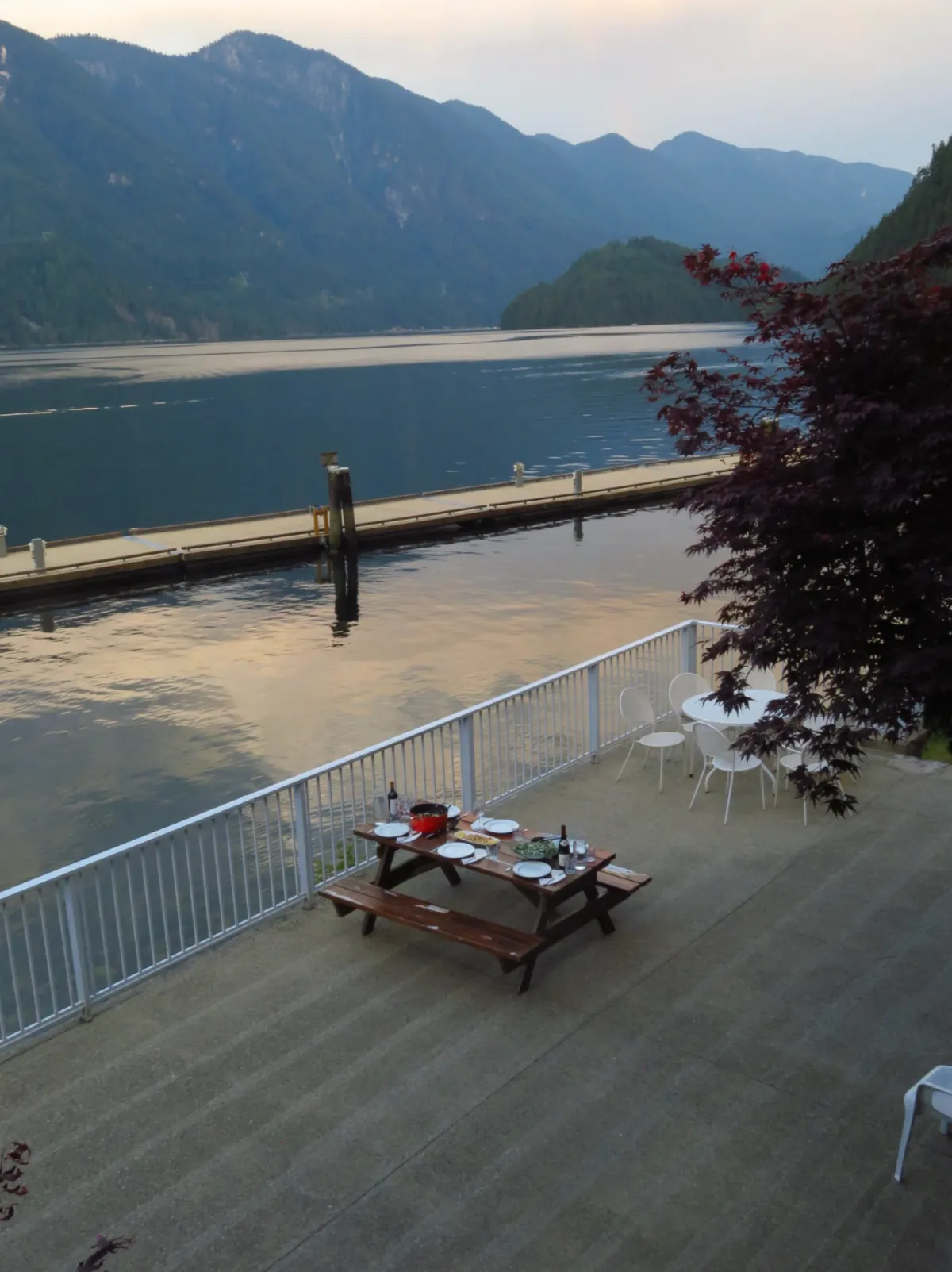 Lakeside deck and dock at dusk