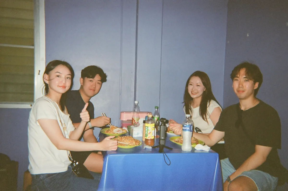 Friends around a dinner table