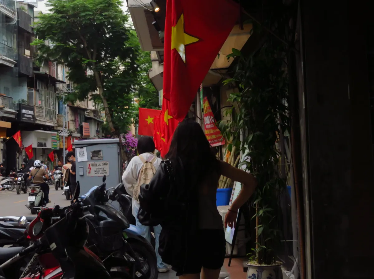 Alley strung with red flags